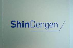 Shindengen Electric Manufacturing sign and logo